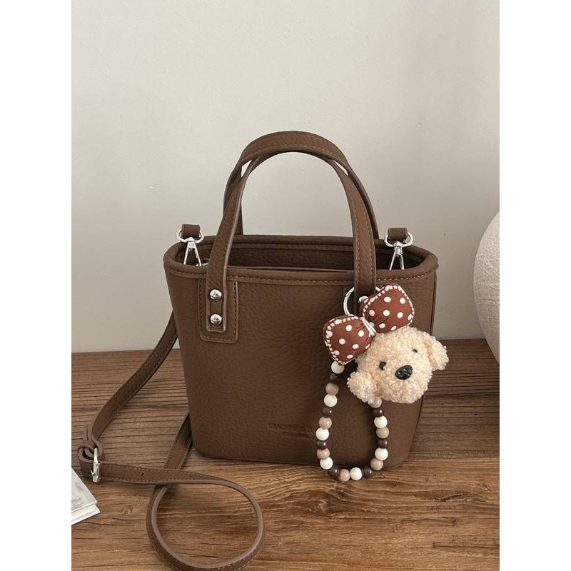 专柜品牌潮流单肩包新款复古洋气手提水桶包女小众简约斜挎包时尚,箱包皮具/热销女包/男包,水桶包,淘宝优惠券,粉丝福利购,淘宝优惠卷