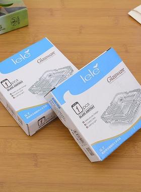 Thick, transparent square glass ashtray with small gear desi