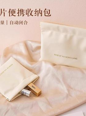 Auto-closing organizer pouch, portable data cable sorting ba