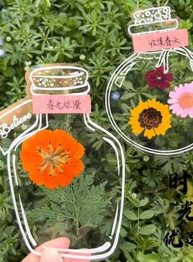 Dried flower bookmarks, bottles containing the essence of sp