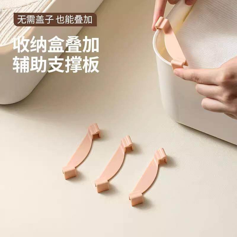 Stackable storage box layering support rods with fixed clips