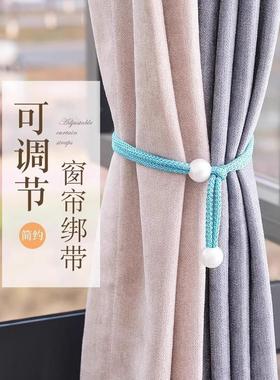 A pair of light luxury pearl curtain tiebacks for living roo