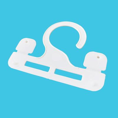 White desiccant moisture absorber with a detachable plastic