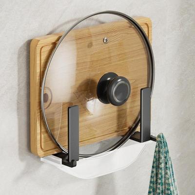 A black, no-drilling pot lid rack that can be wall-mounted.