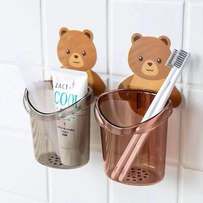 Wall-mounted bear-shaped cup holder and storage rack, adhesi