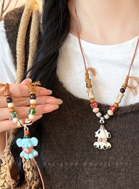 可爱斑点陶瓷小狗彩色串珠项链女新中式可抽拉卡通动物毛衣链配饰