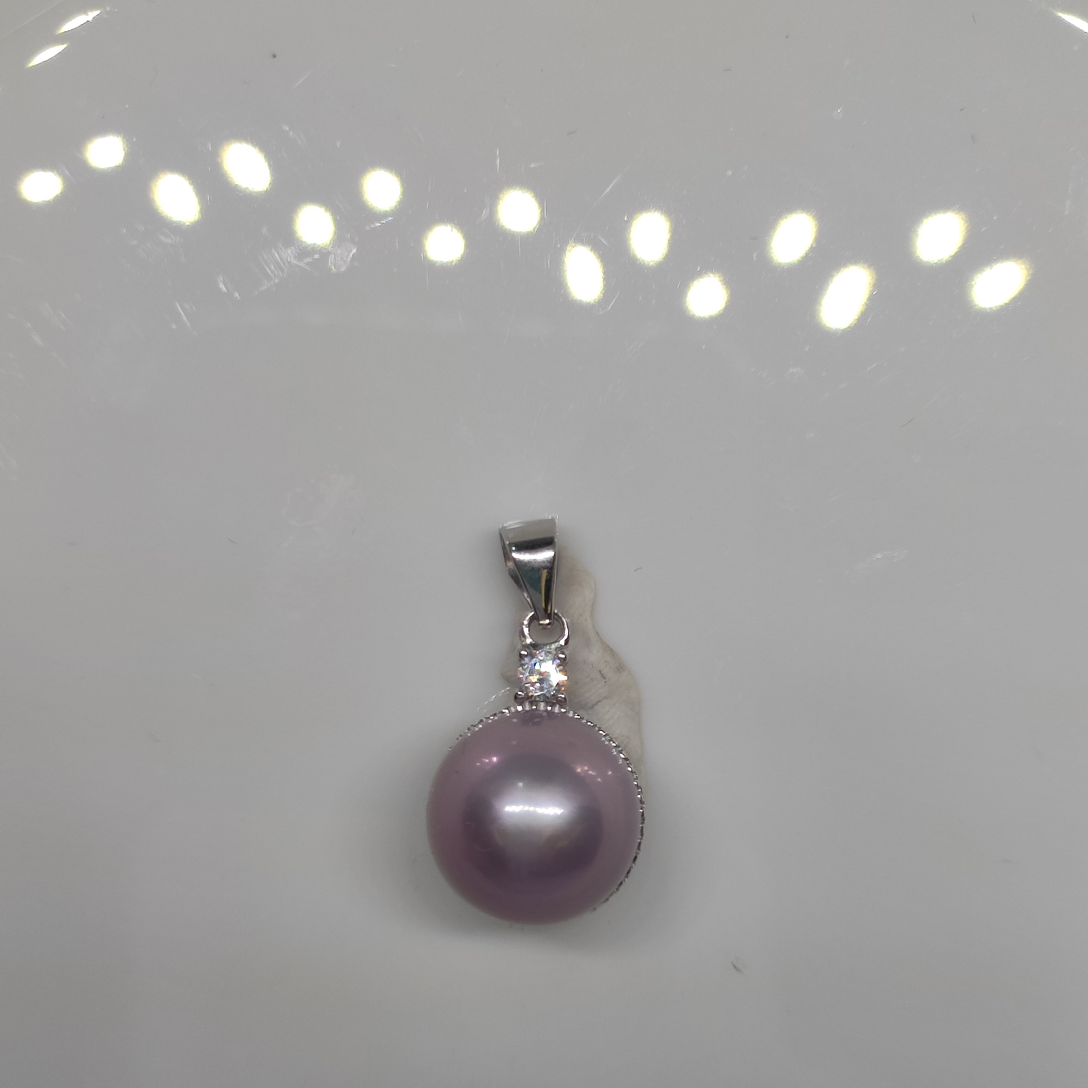 一物一拍天然淡水珍珠强光炫紫色11.8mm纯银皓石镂空底瓜子扣吊坠