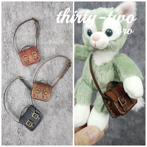 手工皮具娃娃背包挂件