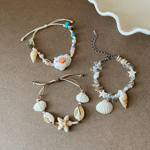 度假风海螺海星贝壳编织抽拉手链女可爱甜美气质时尚优雅手环手饰