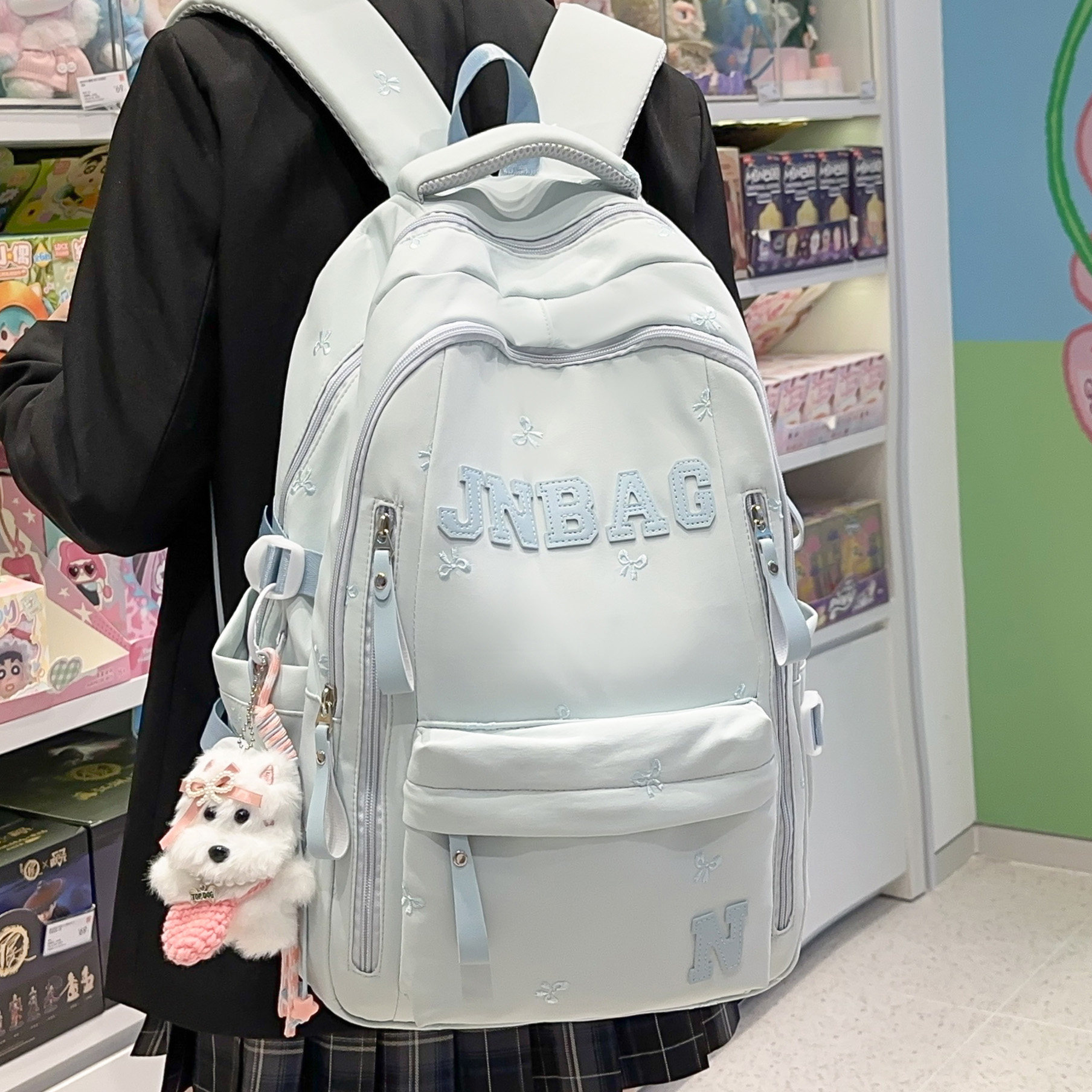 专柜正品学院风书包女纯色蝴蝶结刺绣字母双肩包初中高中大学生上