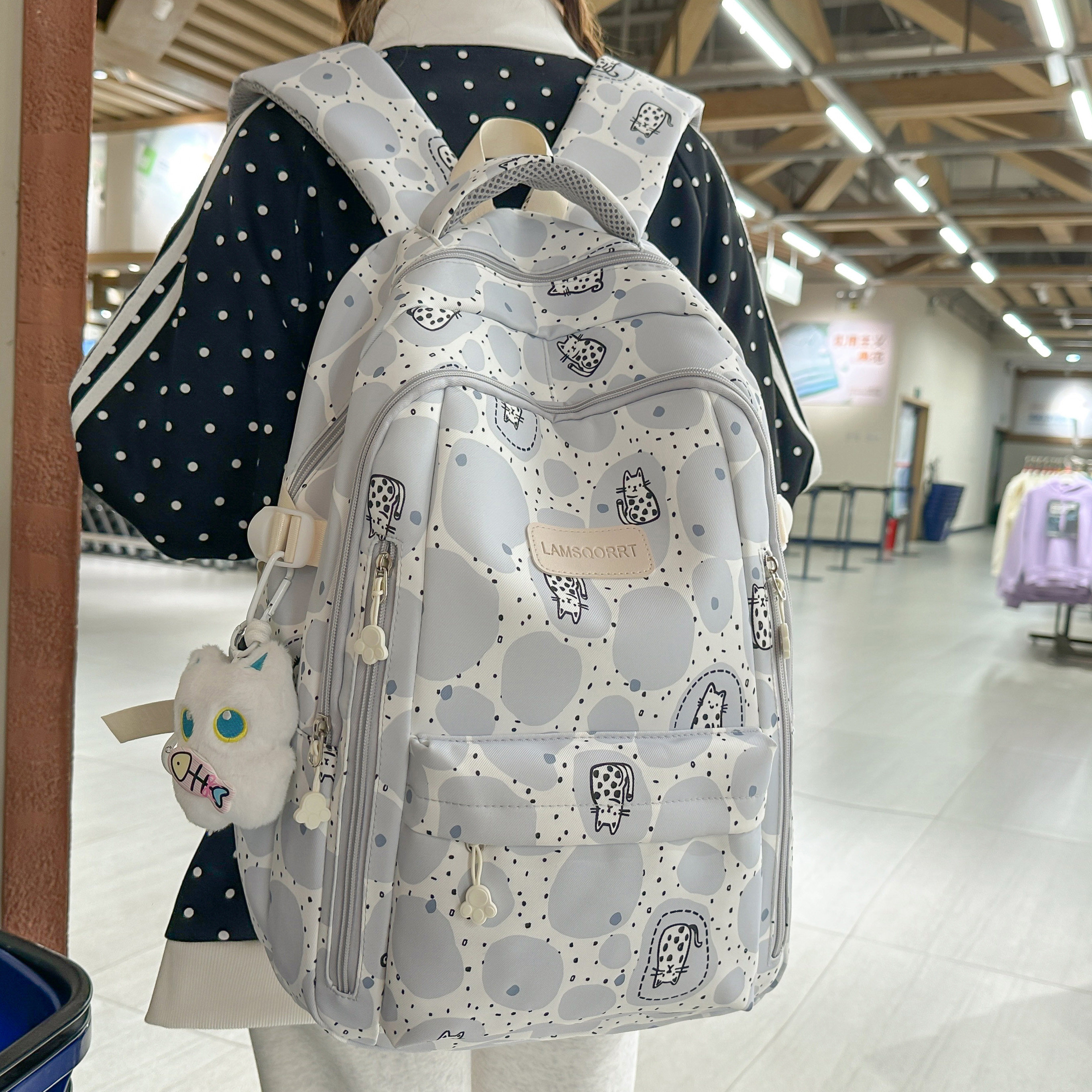 专柜正品休闲书包女韩版百搭时尚斑点印花双肩包初中高中大学生上