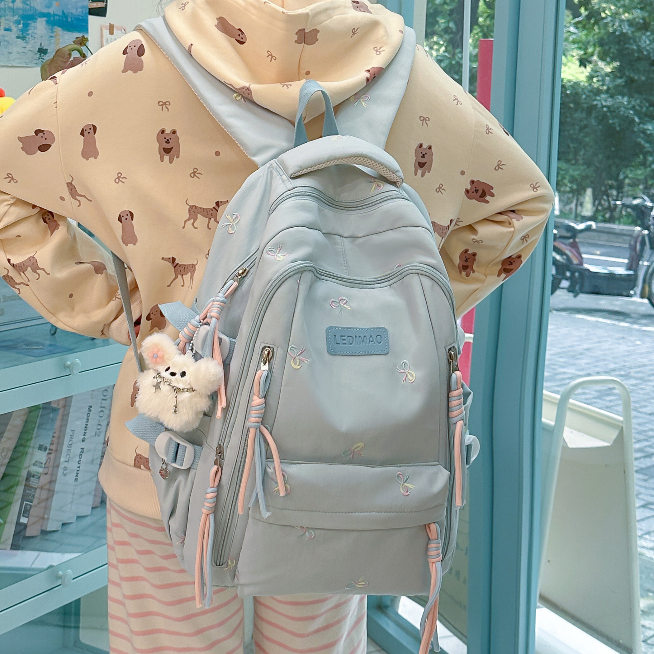 专柜正品纯色书包女日韩风小清新简约蝴蝶结双肩包初中高中大学生