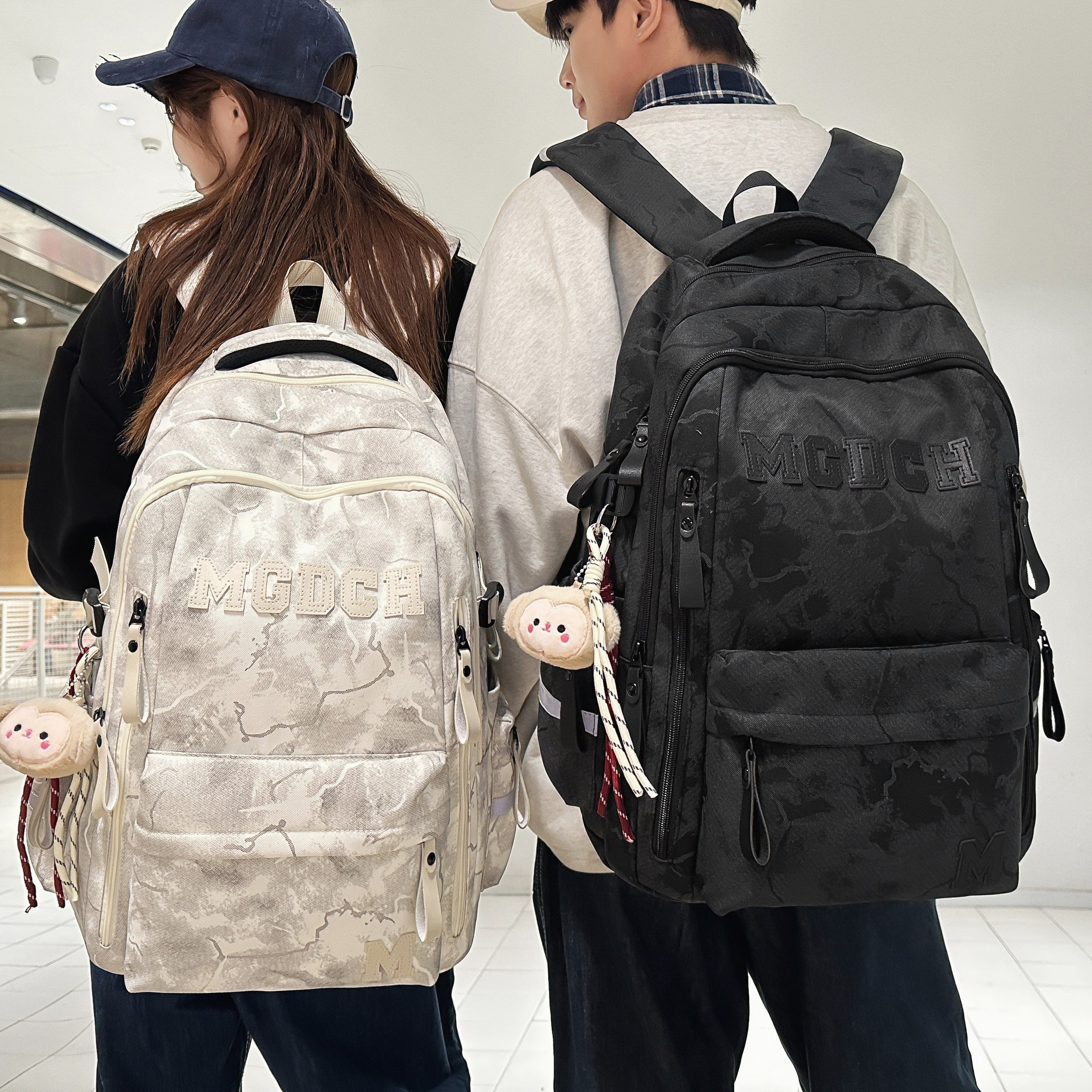 专柜正品日韩风简约潮酷减负护脊书包男女暗纹印花时尚百搭双肩包
