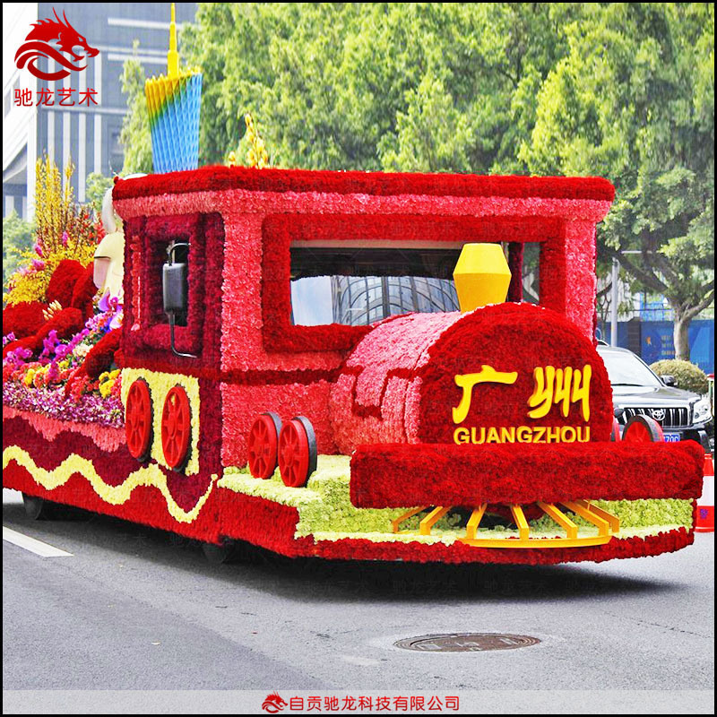 仿真绢花造型巡游彩车制作厂家春节绿雕庆典巡游花车公司