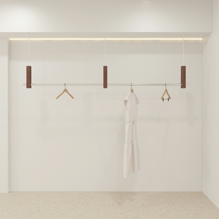 服装 买手店专用挂衣架 店展示架上墙不锈钢仿胡桃木货架陈列架女装