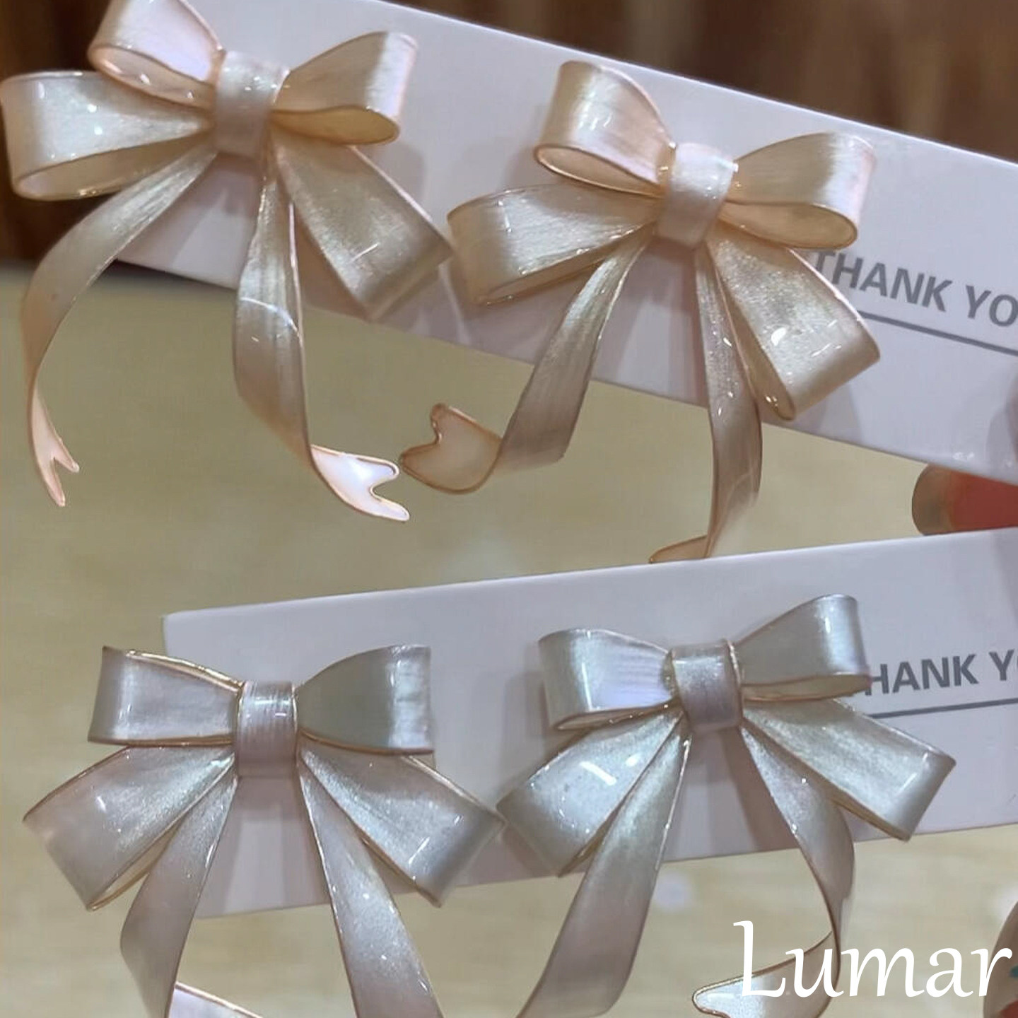 S925纯银法式奶油绸缎拉丝滴油蝴蝶结耳钉女小众设计立体夸张耳饰