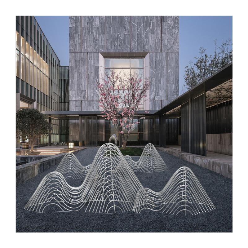 定做不锈钢假山雕塑圆管切片镂空山形鹅卵石水景造型户外创意摆件