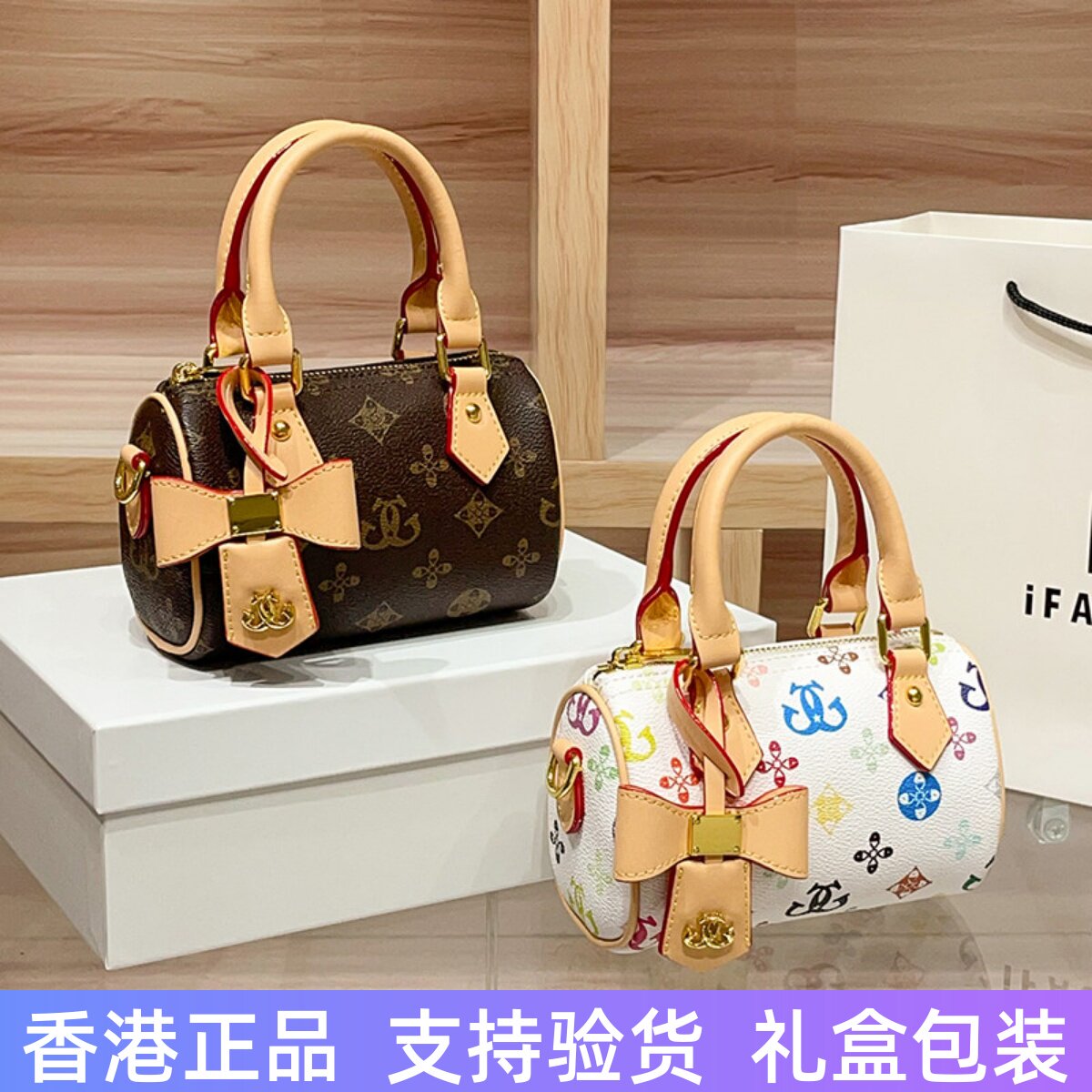 香港轻奢真皮波士顿枕头包女2026新款老花白三彩手提单肩斜挎小包