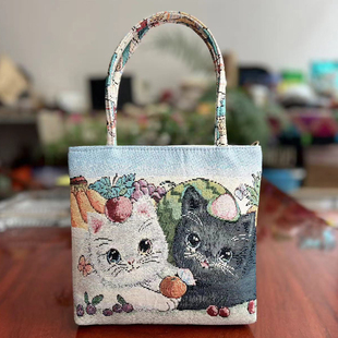 新款民族风手提包沙发布小包清新百搭休闲双面金丝提花迷你小布包