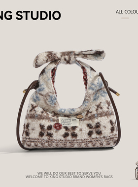 可爱毛绒三角包女2026新款潮蝴蝶结手提包小众设计百搭单肩斜挎包