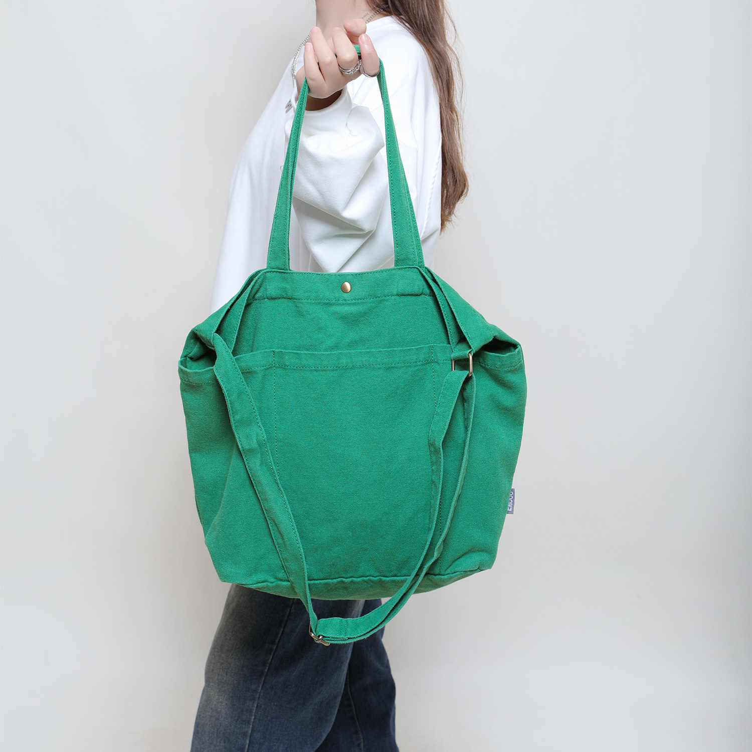 2025秋冬新款低饱和新绿色单肩包韩系慵懒风洗水做旧帆布包大容量