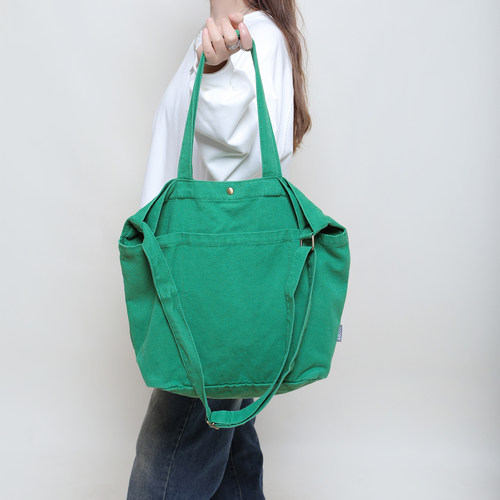 2025秋冬新款低饱和新绿色单肩包韩系慵懒风洗水做旧帆布包大容量