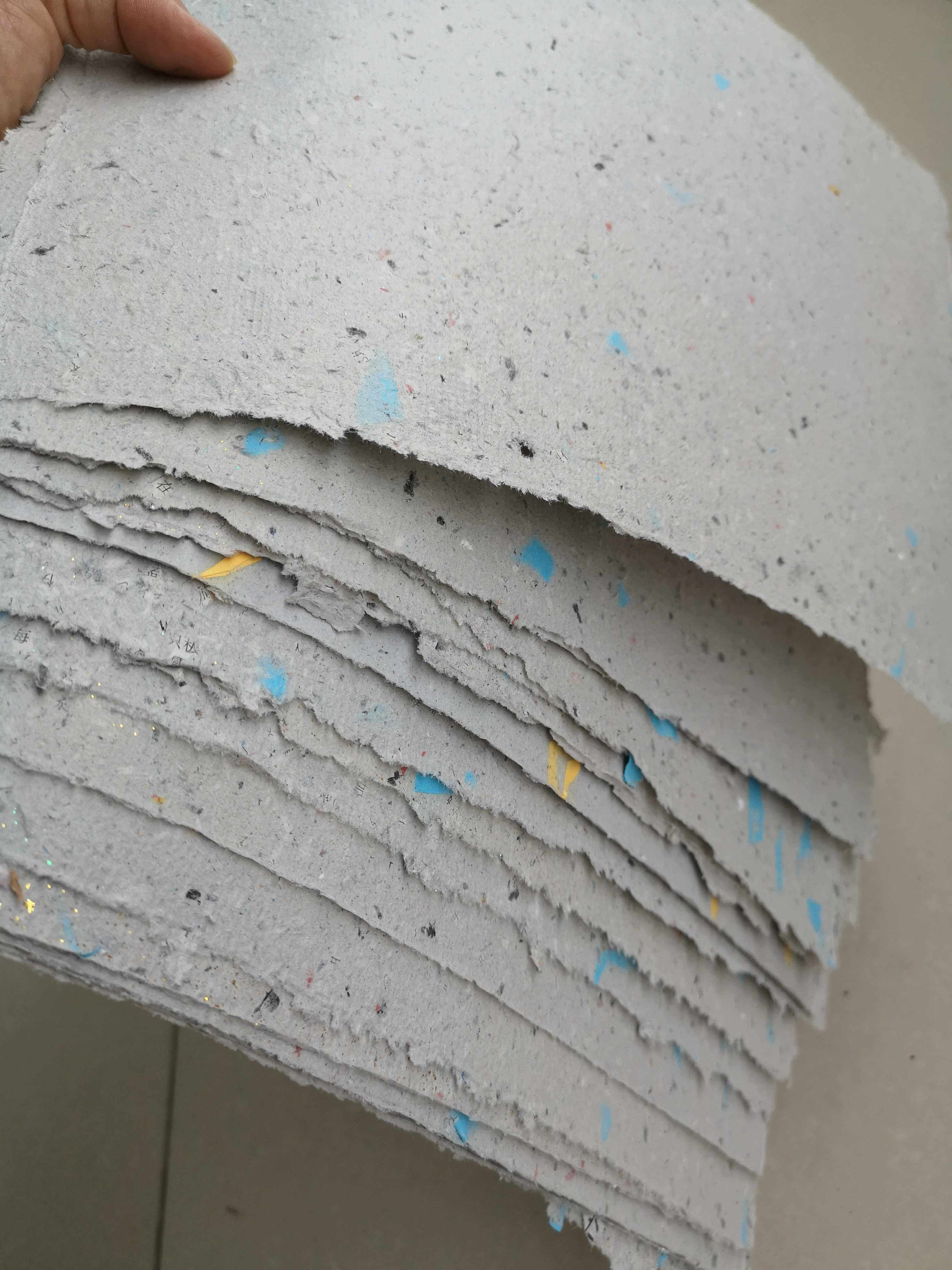 纯手工造纸成品纸 报纸再造纸特色纸手工纸  贺卡包装用纸 造纸术图片