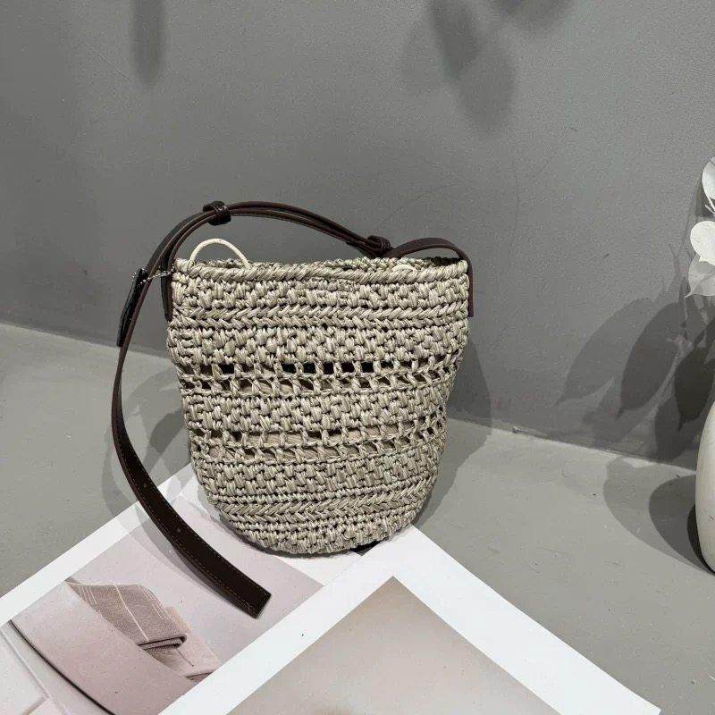 天锚国际法式覆古度假风草编水桶包女小众设计编织镂空单肩斜挎包,箱包皮具/热销女包/男包,水桶包,淘宝优惠券,粉丝福利购,淘宝优惠卷