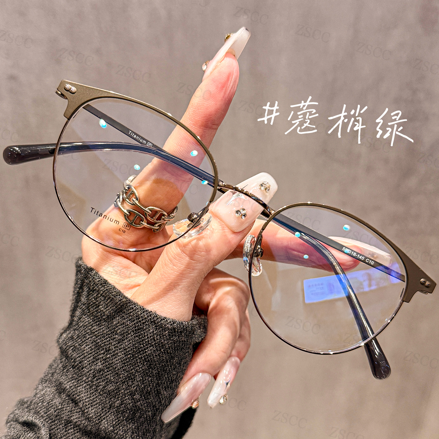 设计师款超轻钛架圆半框眼镜女