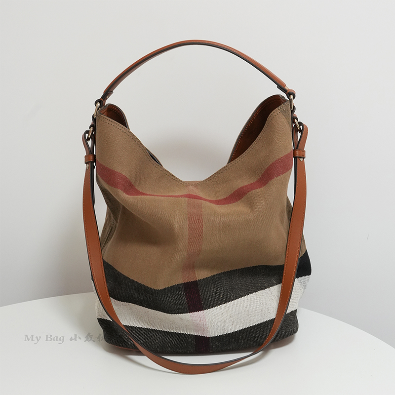 千颂伊同款经典黄麻大手水桶包女