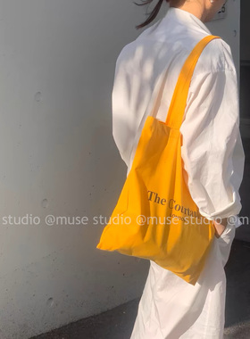 A moment official_夏季黄色字母印花大容量帆布包女帆布购物袋