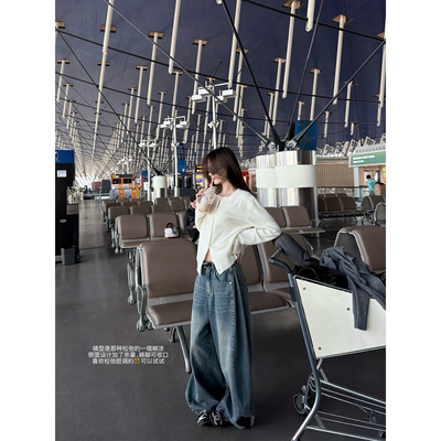 阔版裤脚可收蓝色牛仔裤阔腿长裤