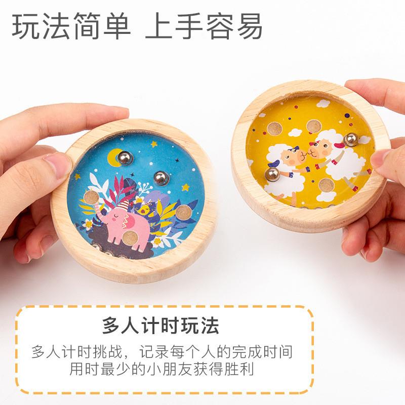 Kids who walk through the maze on the palm of a wooden carto