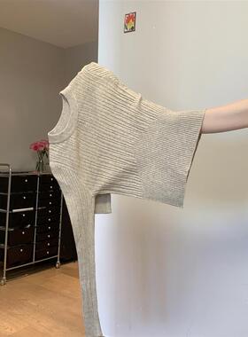 Soft Andys hairy sweater girl has a thin shoulder on the bo