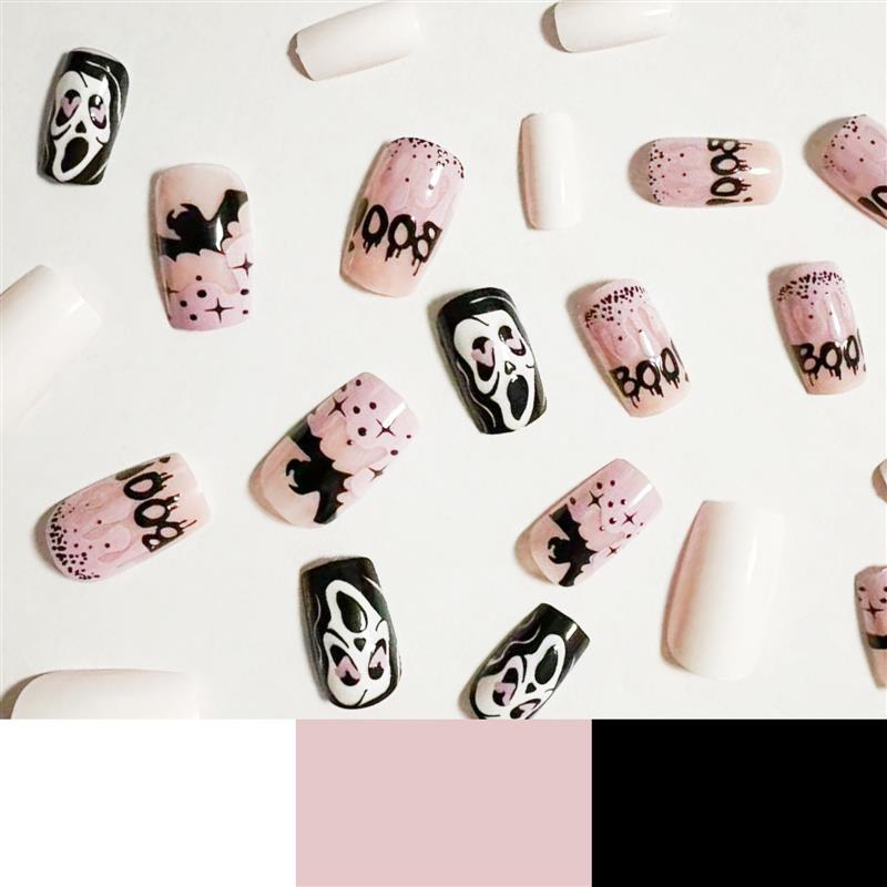 Its Halloween with short nails and freak bats in their nails