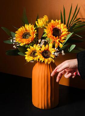 Put a fake sunflower bouquet in the sunflower living room an