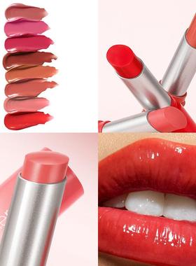 A glass of water with red and creamed lips to keep the eight