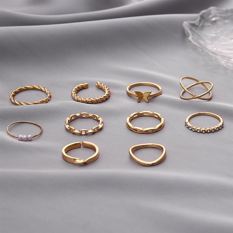 Ten sets of ring, butterflies, pearls, cross-knit rings.