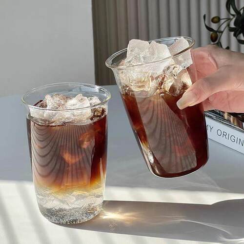 Janes home has a glass of silicon coffee with a large volum
