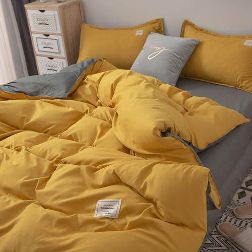 Four pairs of coloured bed sheets were set up in separate do