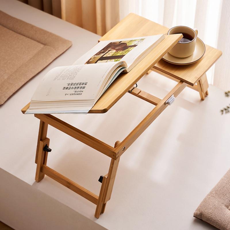A small table in the bed, free of the folding of the bed tab