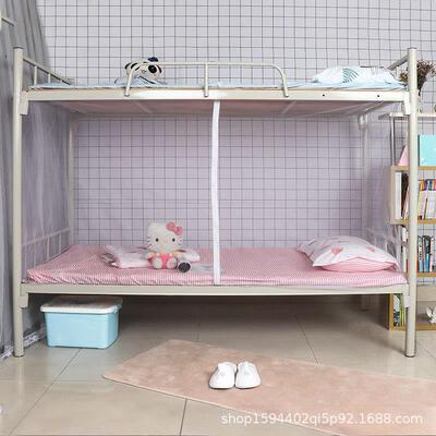 An old bednet on and off of a single-bed dorm room for stude