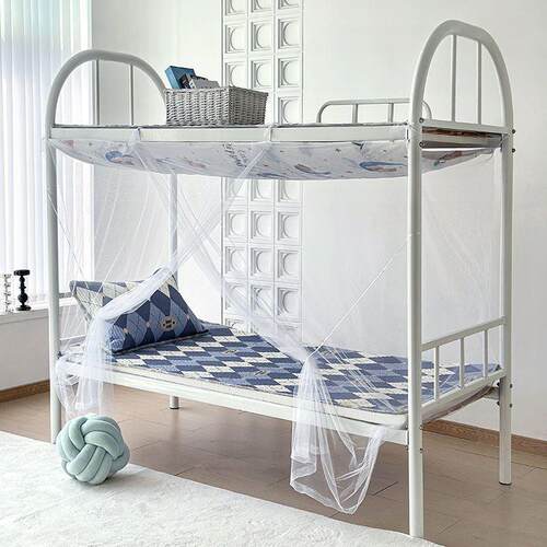 The bed is surrounded by a single bed at 0.9.1.2 m tent in t