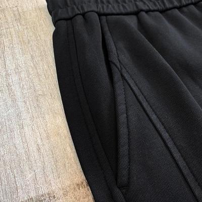 Hes got a big, old-fashioned, velvet sports pants. Hes got