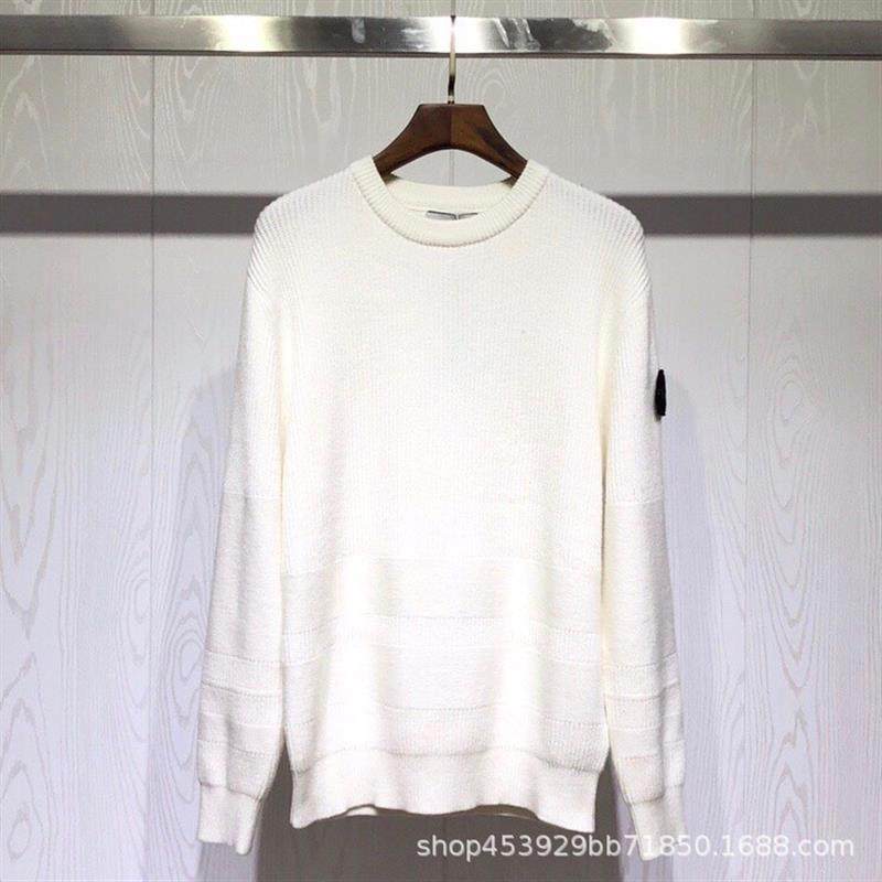 Stone, a man and a woman knit their sweaters in the winter h