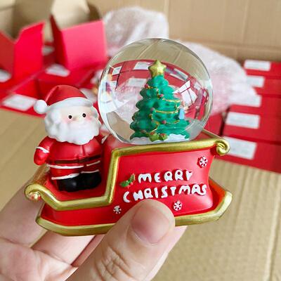 Christmas snowcar glows with crystal ball resin and a Christ