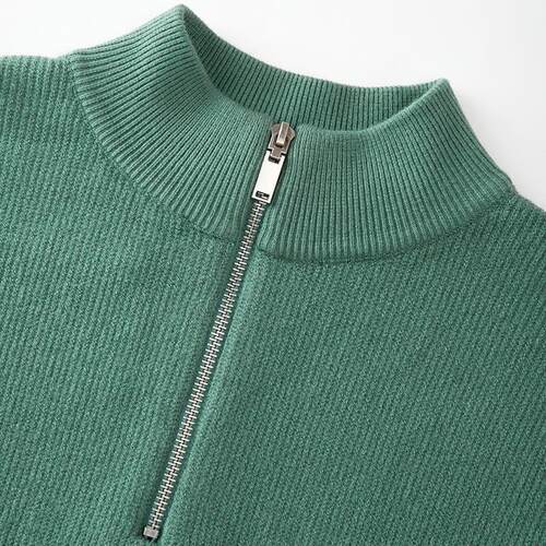 The man in the big sweater zips a half-clank and weaves the