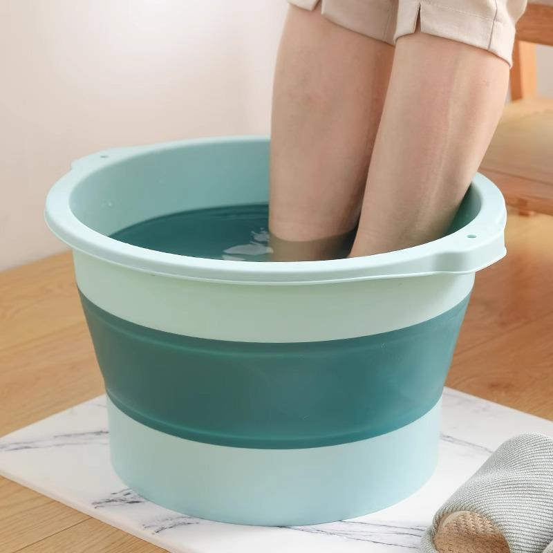 A foldable foot soaking tub made of plastic, designed for ho
