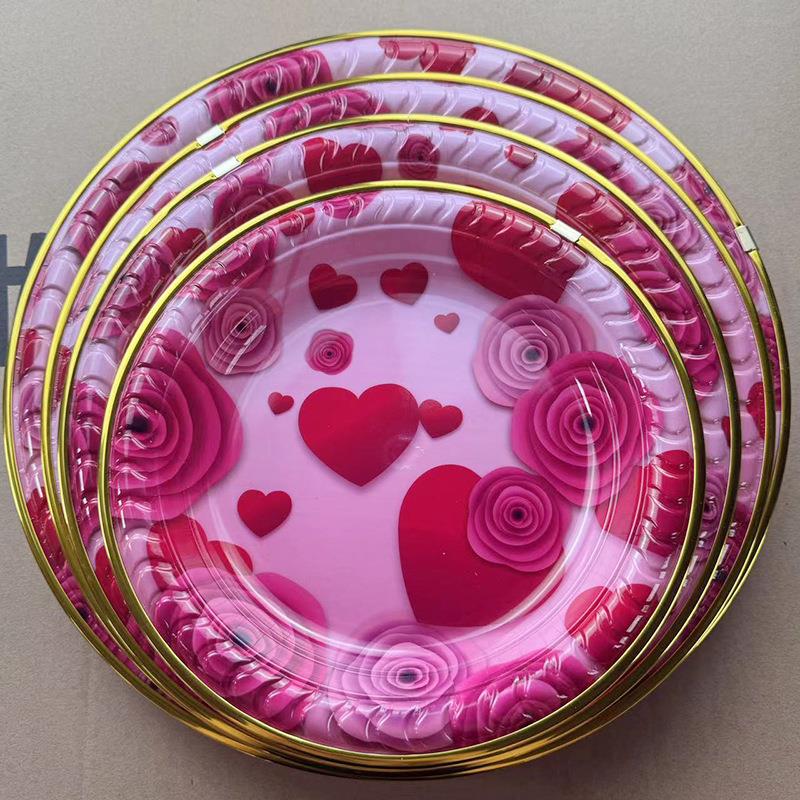 A variety of Valentine's Day plates featuring pink floral an