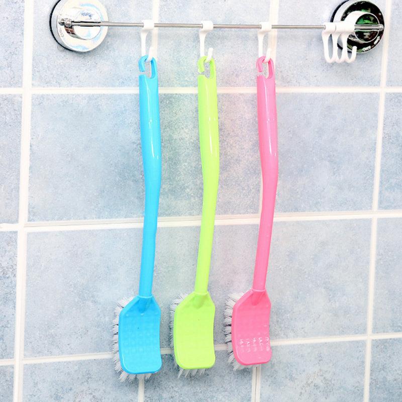 Long-handled plastic toilet brush for cleaning, suitable for